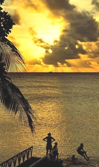 Sunset dip at Funafuti Atoll, Tuvalu