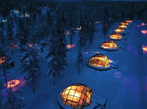 Watching the northern lights from glass igloos in Kakslauttanen, Finland